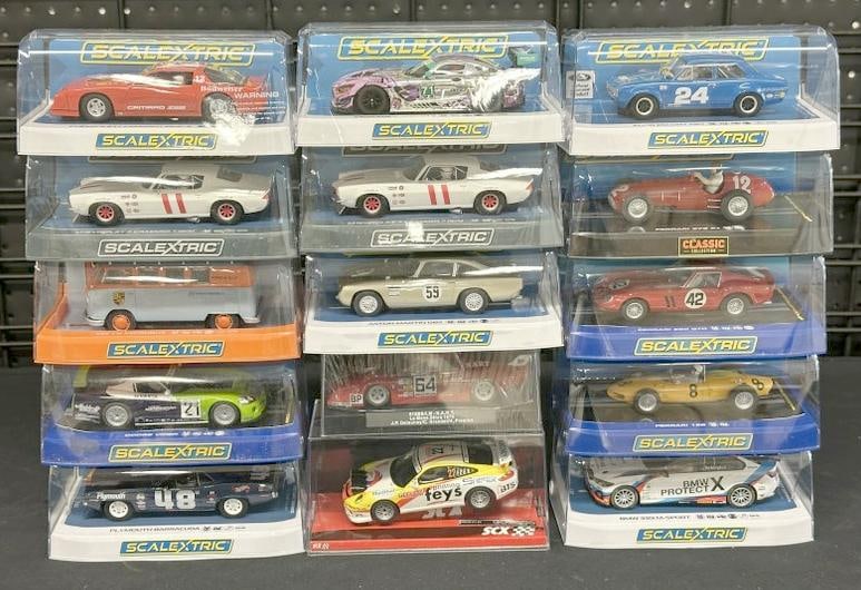 (15) slot cars in original plastic cases, fine condition, just as we got them?.Part II of the over: (15) slot cars in original plastic cases, fine condition, just as we got them?.Part II of the over 2400 piece New England Slot Car collection we are selling, these were his pride and joy, and most all