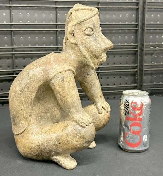 Pre Columbian (?) seated terra cotta figure, nice overall condition, measures 12" high. From Hudson (1 of 5)
