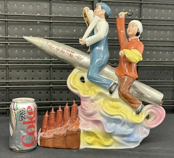 Large Chinese Cultural Revolution porcelain statue with Chairman Mao on missle, very nice condition,: Large Chinese Cultural Revolution porcelain statue with Chairman Mao on missle, very nice condition, measures 15" high x 16" wide.