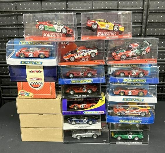 (20) slot cars in original cases from estate collection we are selling. All in fine condition. Part (1 of 4)