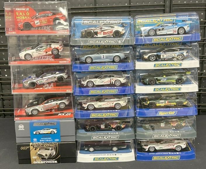 (18) slot cars in original cases from estate collection we are selling. All in fine condition. Part (1 of 4)