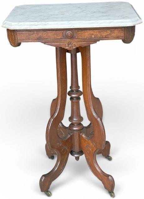 Eastlake walnut marble top stand, very nice overall condition, structurally sound, from fine home in: Eastlake walnut marble top stand, very nice overall condition, structurally sound, from fine home in the Hudson Valley, measures 30" high x 19.5" wide x 15" deep.