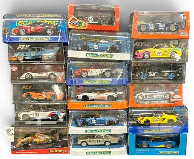 (18) slot cars in original cases, fine unused condition?..This is PART III of the New England estate (1 of 3)