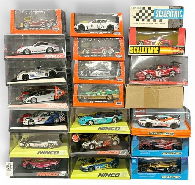 ( 21 ) slot cars in original cases, unused, fine condition?.This is PART III of the New England: ( 21 ) slot cars in original cases, unused, fine condition?.This is PART III of the New England estate slot car collection we are selling, just as we received them, unused, and overall fine condition?