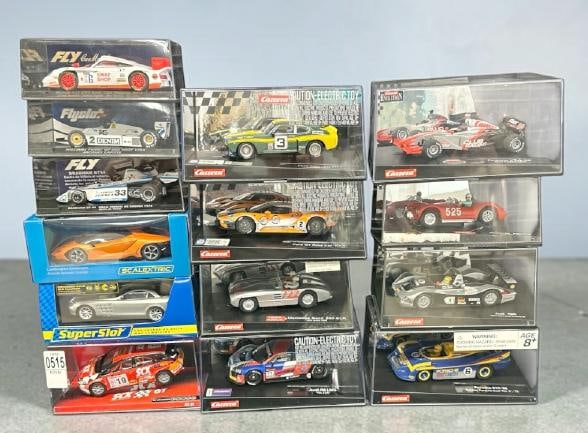 ( 14) slot cars in original cases, unused, fine condition?.This is PART III of the New England: ( 14) slot cars in original cases, unused, fine condition?.This is PART III of the New England estate slot car collection we are selling, just as we received them, unused, and overall fine condition?.