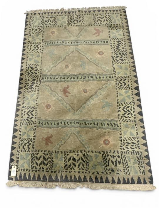Tibetan (?) wool decorative design area rug, nice overall condition, from fine home in Hudson: Tibetan (?) wool decorative design area rug, nice overall condition, from fine home in Hudson Valley, measures 74" x 47.5".