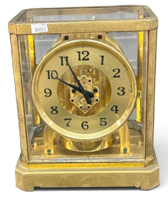 LE COULTRE ATMOS mantel clock, running condition, the case has a lot of wear to finish, inside: LE COULTRE ATMOS mantel clock, running condition, the case has a lot of wear to finish, inside movement is nice and clean, from local estate. Measures 9.5" high x 7.5" wide, the front frame to dorr on