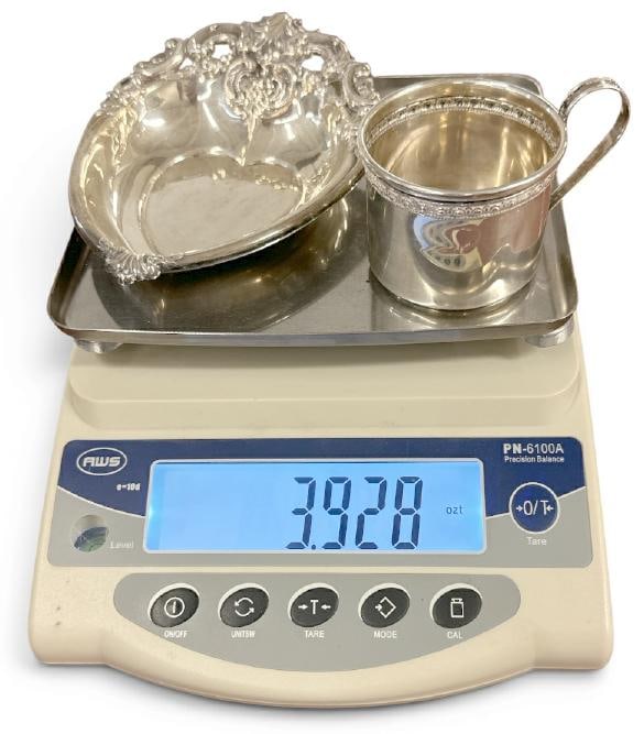 (2) pc. Sterling silver lot to include hear shaped dish and baby's cup, nice condition, weight is: (2) pc. Sterling silver lot to include hear shaped dish and baby's cup, nice condition, weight is 3.92 troy ounces?..