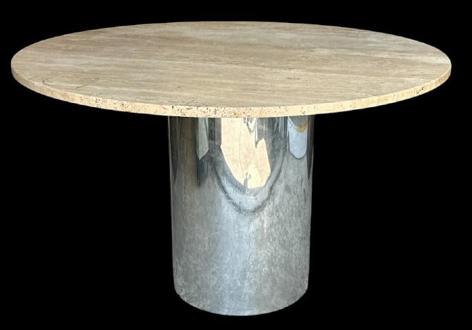 Mid Century Modern round travertine top with chrome cylinder base, nice estate collection, not: Mid Century Modern round travertine top with chrome cylinder base, nice estate collection, not signed, nice overall estate condition. The table measures 29" high x 46" across the top. From fine estate