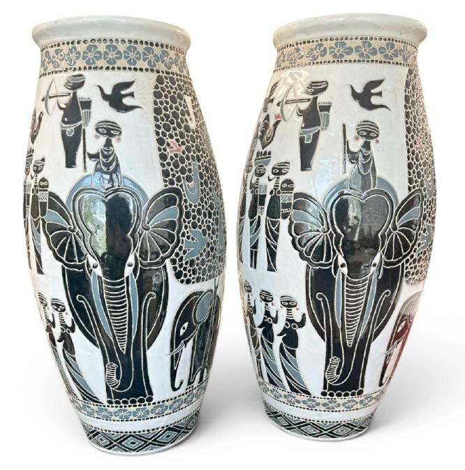Matched pair porcelain 19.5" high African motif and design vases, decorated all the way around with: Matched pair porcelain 19.5" high African motif and design vases, decorated all the way around with figures and animals. (Stamped on bottom as pictured ( Vietnam ), in fine estate condition, I see no 