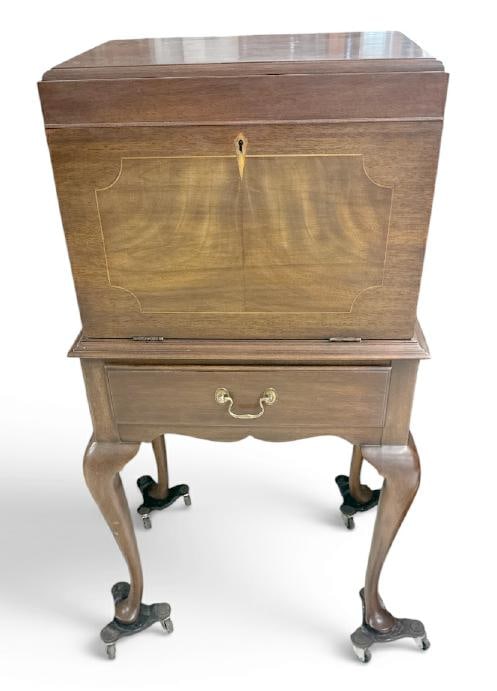 HENKEL-HARRIS ( VIRGINIA GALLERIES ) fine mahogany silver cabinet with inlay, structurally sound,: HENKEL-HARRIS ( VIRGINIA GALLERIES ) fine mahogany silver cabinet with inlay, structurally sound, was filled with sterling silver we are selling. In very nice clean condition. Measures 40" high x 21.5