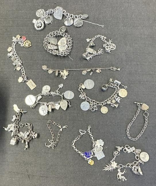 (12) STERLING SILVER charm bracelets, some with more charms than others, good lot for a dealer to (1 of 4)