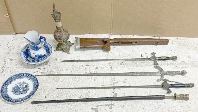 Misc. estate lot to include 4 swords, one being a a walking stick with brass handle, a gun stock, (1 of 6)