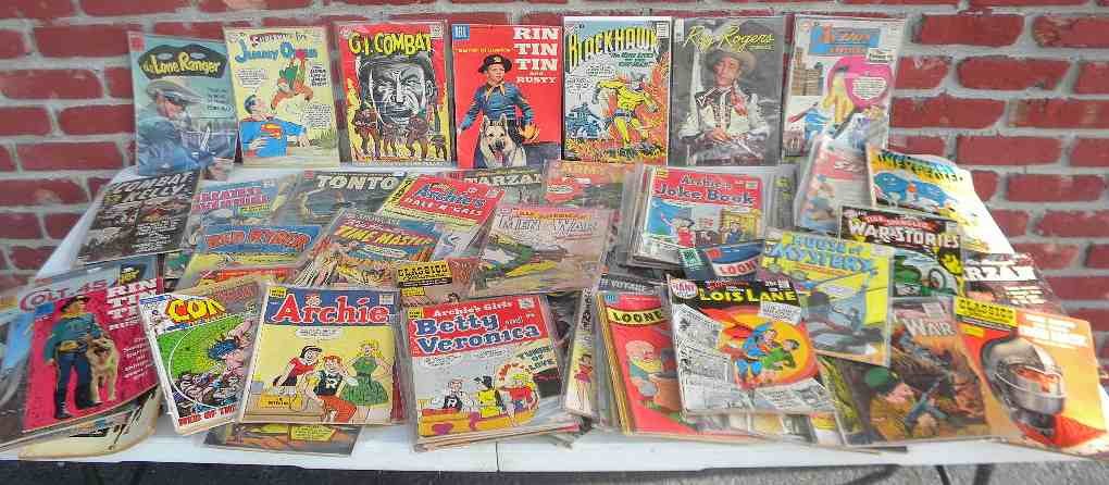 Lot of 105 Vintage Comic Books Mixed Lot: Lot of 105 vintage comic books, including Rin Tin Tin, Roy Rogers, Action Comics, Tarzan, Archie, Lone Ranger, Red Ryder, Disney, Combat Kelly, Superman, Looney Tunes, Sherlock Holmes, Classics Illust