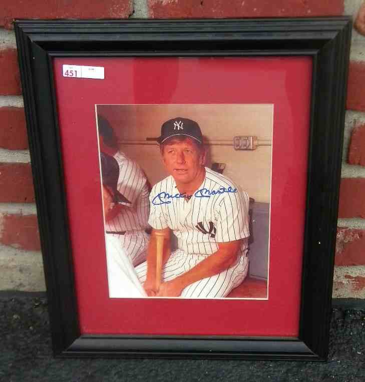 Mickey Mantle Autographed Photo: Mickey Mantle signed photo in uniform in dugout, possibly NY Yankee Old Timers game, framed and matted, frame measures 16 1/2" X 13 1/2", very good condition, from estate sports collection