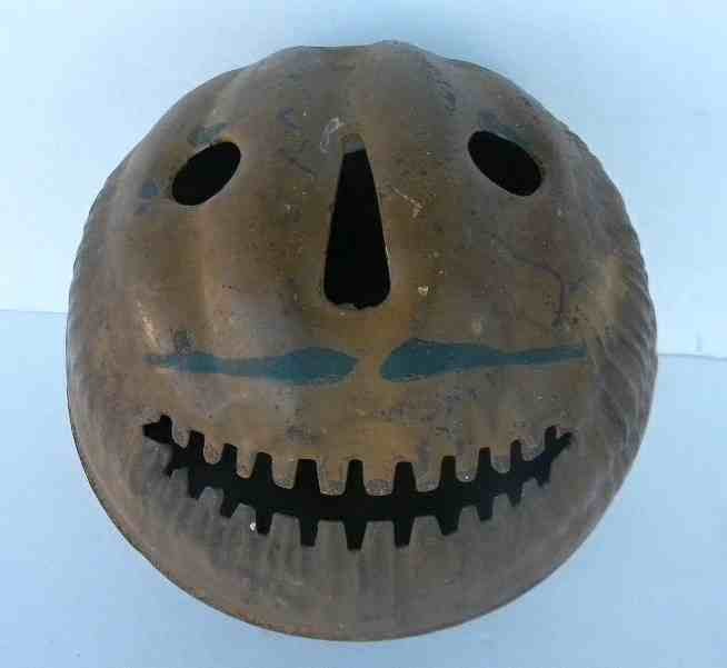 Early Tin HALLOWEEN Parade Jack O Lantern Orig. Paint: Early Tin 2 Piece HALLOWEEN Parade Lantern, with faded original paint, some deterioration on one edge, approx. 3" long. Measures 7" high and 6 1/2" across....