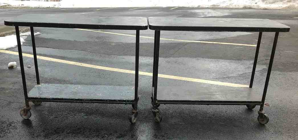 (2) MATCHING INDUSTRIAL CARTS: (2) MATCHING INDUSTRIAL CARTS, FROM LABORATORY IN STONE RIDGE, NEW YORK. HAVE OLD BLACK PAINT, TOPS ARE GALVANIZED, WOOD BOTTOM SHELVES. THEY MEASURE 44" LONG, 19" DEEP, 34 1/2" HIGH. NICE CONDITION.