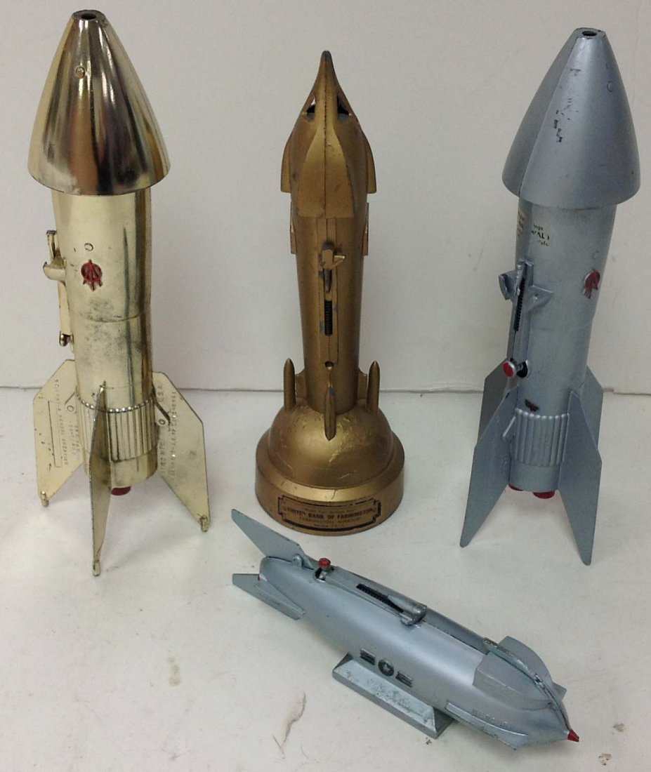 Lot of 4 Vintage advertising rocket piggy banks: Lot of 4 Vintage advertising rocket piggy banks tallest is 11 1/2"h
