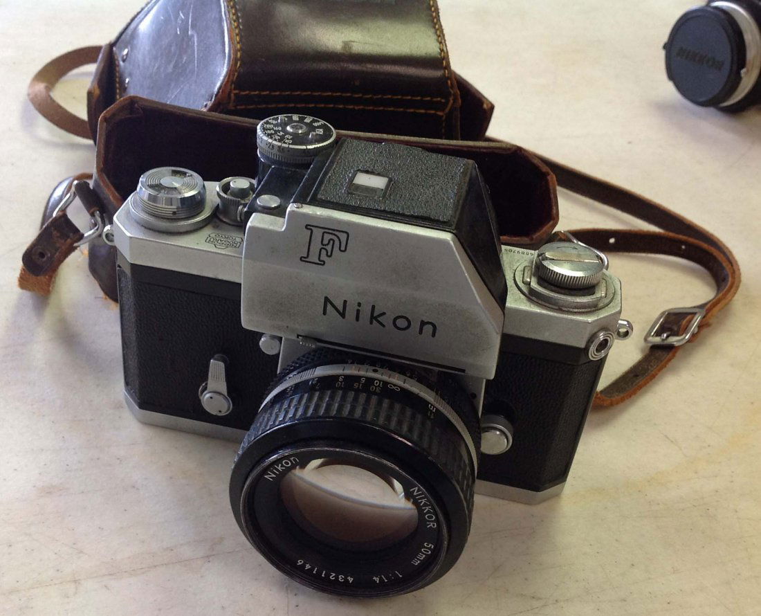 NIKON F SLR CAMERA W/NIKKOR 50MM LENS AND LEATHER CASE: Nikon F SLR Camera w/Nikkor 50mm lens and leather case