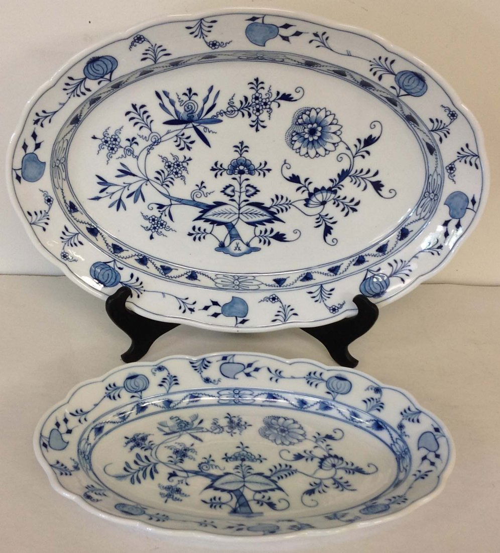 2 Meissen Blue Onion pattern platters, 1 has crossed: 2 Meissen Blue Onion pattern platters, 1 has crossed sword mark measures 19" x 14", 1 small chip underneath, small platter measures 15 1/2" x 10", marking says Meissen, as pictured