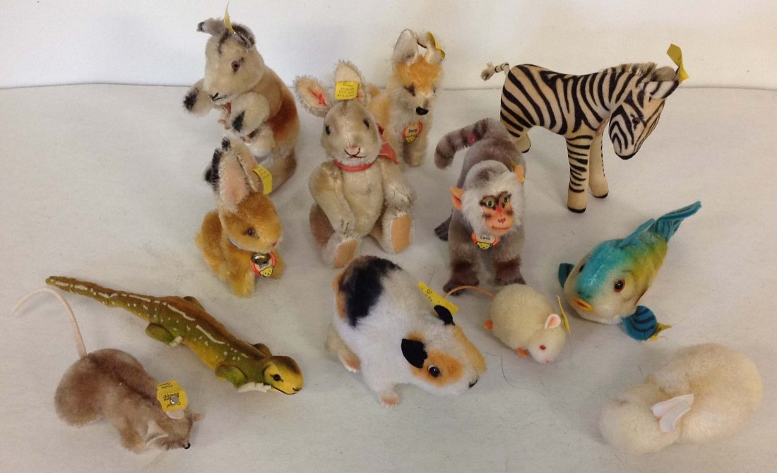 Lot of 12 vintage Steiff animals, 2 with no tags,: Lot of 12 vintage Steiff animals, 2 with no tags, includes zebra, coco the monkey, rabbit, mouse, xorry the fox, kangoo the kangaroo, swinny the hamster(?), flossy the fish, pieps the mouse, and anoth