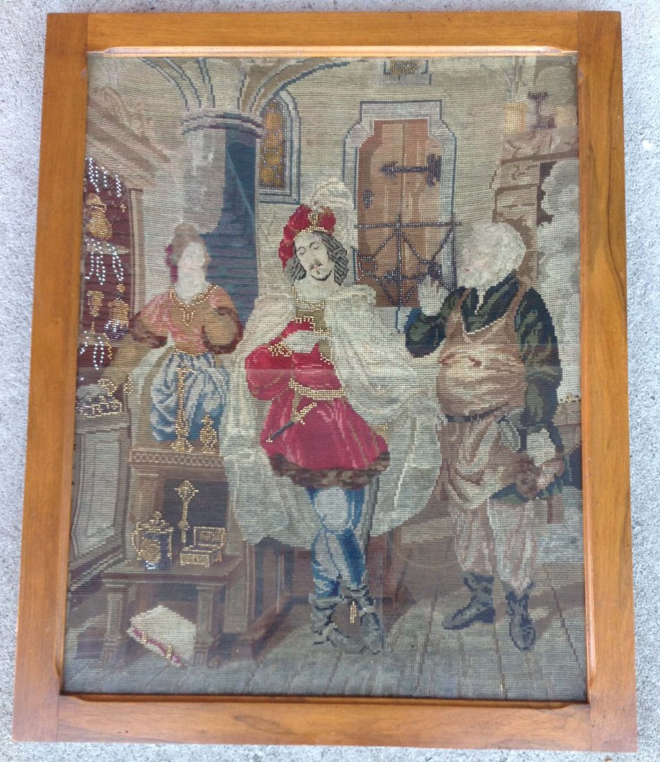 Early European Needlepoint of 3 people inside shop in: Early European Needlepoint of 3 people inside shop in walnut frame, measures 24 x 20