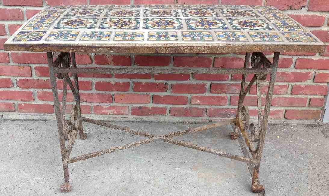 Old Decorative Iron Base Outdoor Table with Tile Top: Old Decorative Iron Base Outdoor Table with Tile Top, from estate in Kingston, New York. Was purchased by old time Antique dealer Fred Johnson, from the Frederic Marsh estate in Woodstock, N.Y. It mea