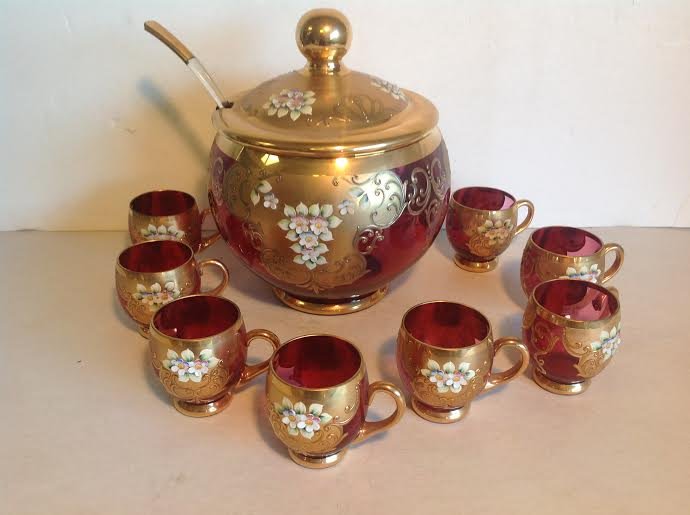 BOHEMIAN GLASS PUNCH BOWL SET WITH GOLD & ENAMEL: BOHEMIAN GLASS PUNCH BOWL SET WITH GOLD & ENAMEL FLOWERS, INCLUDES LID, LADLE & 8 CUPS, EXCELLENT CONDITION, NO DAMAGE, PUNCH BOWL W/LID MEASURES 12" HIGH, CUPS MEASURE 3" HIGH, AS PICTURED