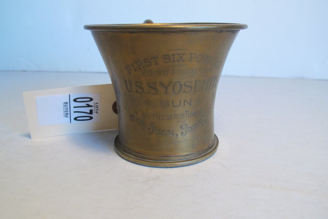 DIRK VAN ERP 1898 Trench Art Presentation Cup: 1898 BRASS TRENCH ART PRESENTATION CUP, FIRST SIX POUNDER FIRED FROM THE USS YOSEMITE GUN, SAN JUAN, PUERTO RICO, WINCHESTER REPEATING ARMS MADE BY DIRK VAN ERP, MEASURES 3 6/16" TALL X 4" ACROSS, GOO
