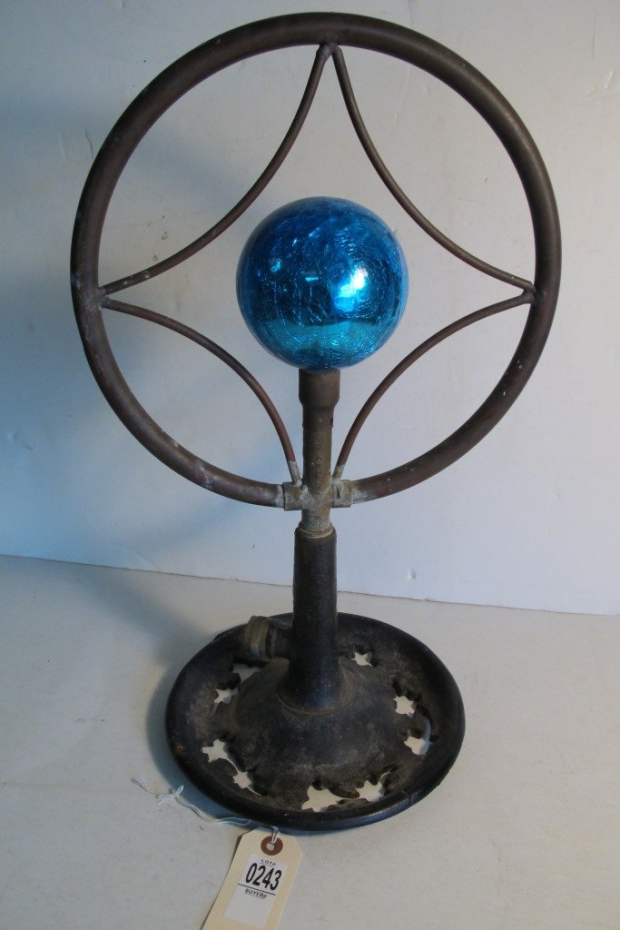 CAST IRON COPPER LAWN SPRINKLER, MICROPHONE STYLE,: CAST IRON COPPER LAWN SPRINKLER, MICROPHONE STYLE, MEASURES 19 1/2" X 11", GOOD CONDITION, AS PICTURED