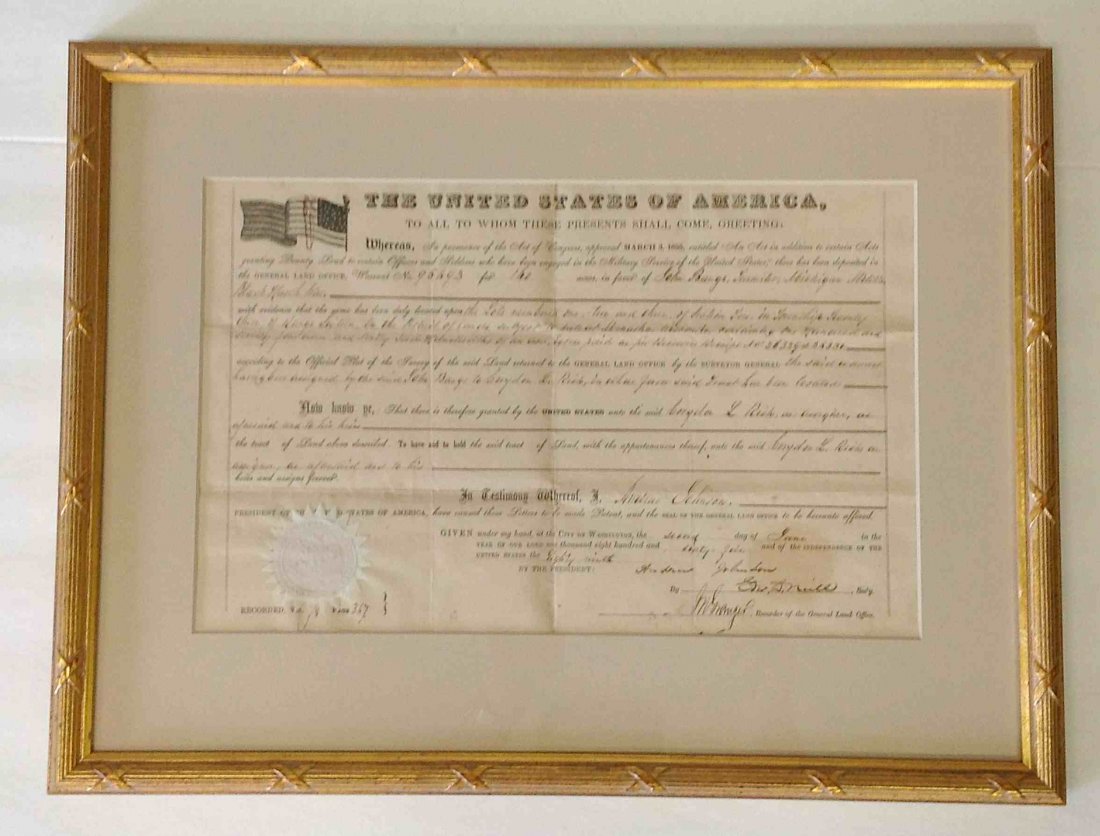ANDREW JOHNSON SIGNED 1865 RICH FAMILY LAND GRANT FROM: ANDREW JOHNSON SECRETARIAL SIGNED 1865 RICH FAMILY LAND GRANT FROM MILITARY SOLDIER JOHN BANGS, TEAMSTER, MICHIGAN MILITIA, BLACK HAWK WAR. NICELY FRAMED AND MATTED, FRAME MEASURES 16" X 21", FROM WAL