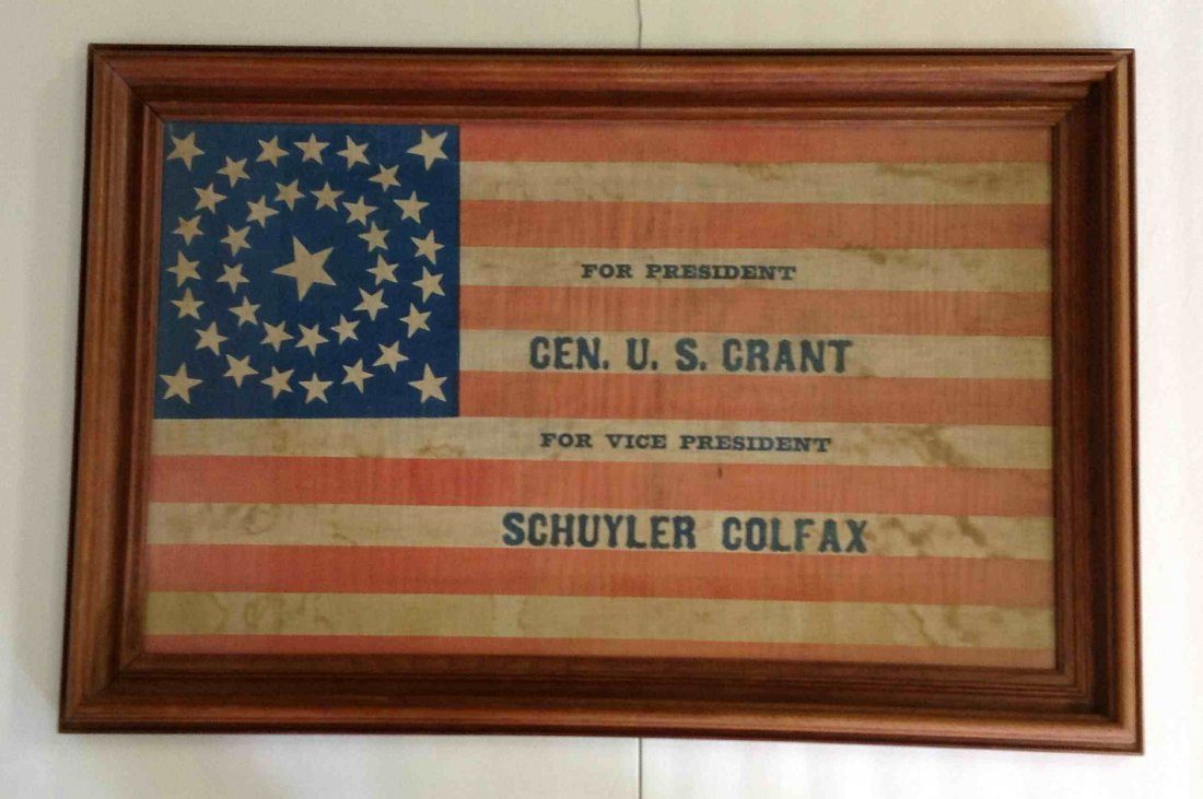 GENERAL U S GRANT & SCHUYLER COLFAX PRESIDENTIAL: GENERAL U S GRANT & SCHUYLER COLFAX PRESIDENTIAL CAMPAIGN FLAG, IN WALNUT FRAME, GLAG MEASURES 16 1/2" X 26 1/2". HAS LIGHT STAINS AS PICTURED. FROM THE WALTER RICH ESTATE COLLECTION.