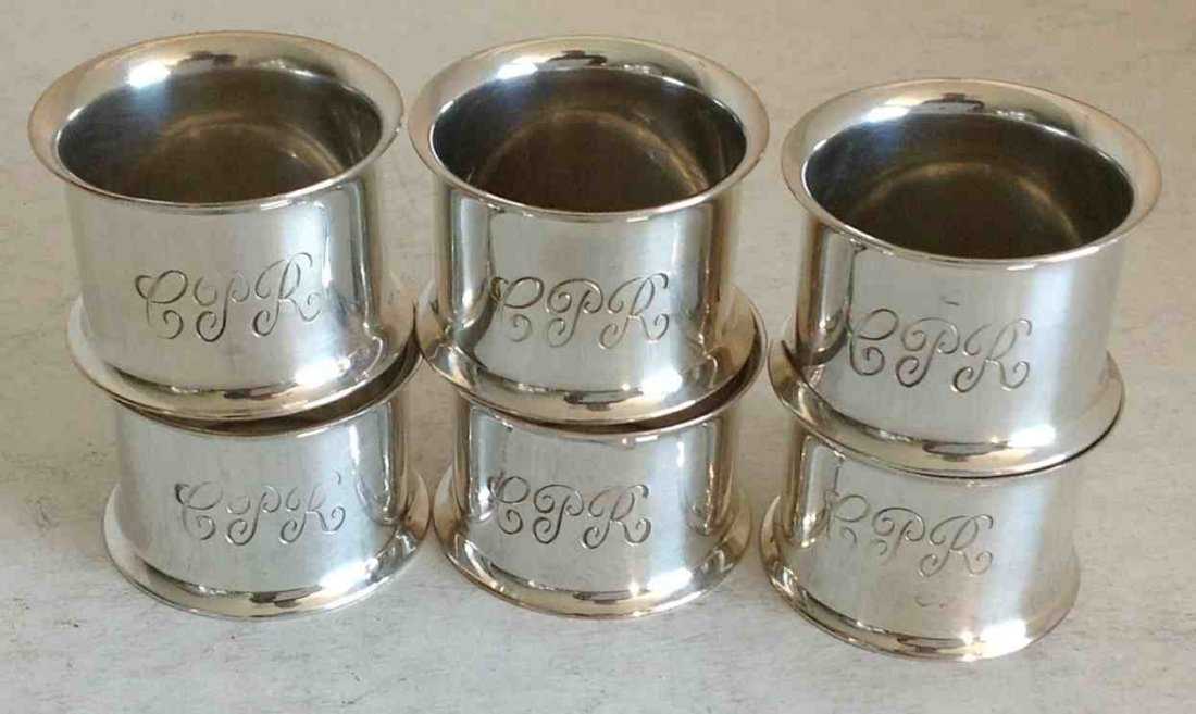 6 CANADIAN PACIFIC RR SILVERPLATE NAPKIN RINGS, MEASURE: 6 CANADIAN PACIFIC RR SILVERPLATE NAPKIN RINGS, MEASURE 1 1/4" HIGH, AS PICTURED, FROM WALTER G RICH ESTATE COLLECTION