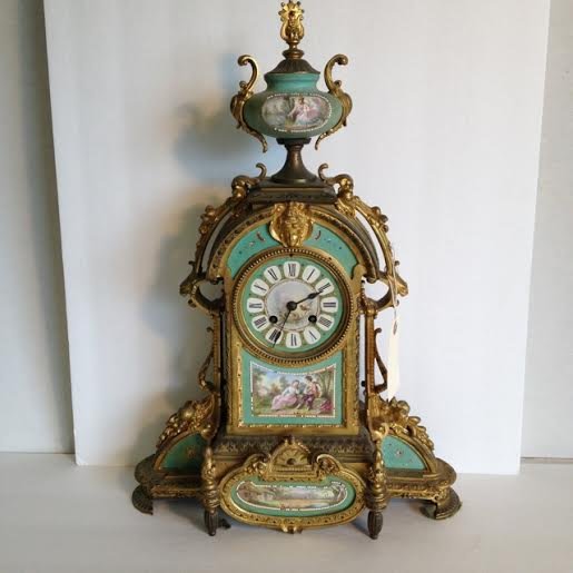 EARLY DECORATIVE FRENCH HANDPAINTED GILT IRON FANCY: EARLY DECORATIVE FRENCH HANDPAINTED GILT IRON FANCY CLOCK, MISSING SOME PAINTED BEADWORK, NO CRYSTAL ON FRONT, AND BACK GLASS COVER IS CRACKED. Measures 20" high. No key or pendulum, marked on movemen