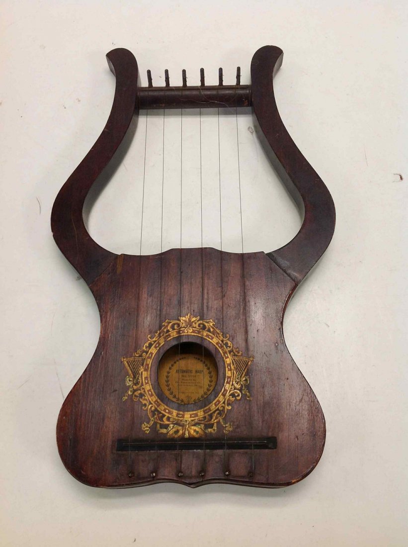 ODD FELLOW AUTOMATIC HARP BY WARD STILSON CO. NEW: ODD FELLOW AUTOMATIC HARP BY WARD STILSON CO. NEW LONDON, OHIO, MUSIC PLAYS WHEN WOUND, FROM CLOSED LODGE IN SOUTHERN, N.Y. MEASURES 21" X 12 1/2".