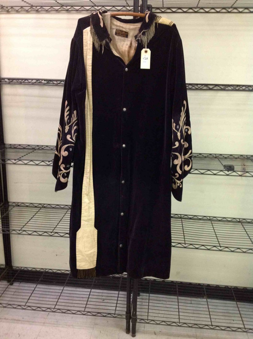 ODD FELLOW CHAPAIN'S ROBE, BLACK VELVET WITH WHITE TRIM: ODD FELLOW CHAPAIN'S ROBE, BLACK VELVET WITH WHITE TRIM AND SILVER FRINGE, INSIDE LINING HAS DAMAGE, FROM CLOSED SOUTHERN NEW YORK LODGE