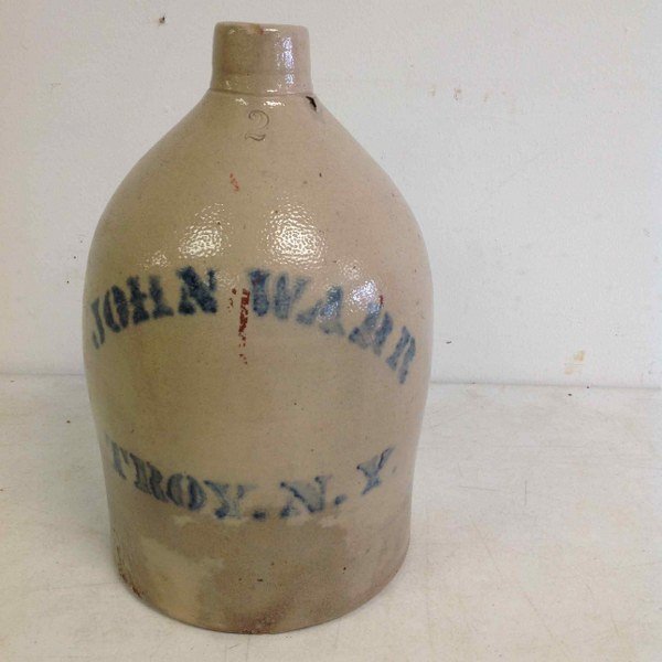 JOHN WARD TROY N.Y. STONEWARE 2 GALLON JUG. MEASURES: JOHN WARD TROY N.Y. STONEWARE 2 GALLON JUG. MEASURES 14" HIGH.