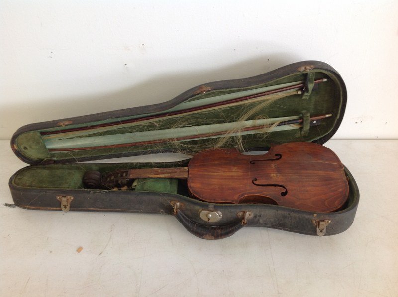 JACOB ECKERT 1885 VIOLIN IN AS FOUND ESTATE CONDITION.: JACOB ECKERT 1885 VIOLIN IN AS FOUND ESTATE CONDITION. WRITTEN ON INSIDE, MEASURES 23 1/4" TOP TO BOTTOM. MISSING PART OF NECK, AND OTHER PARTS, AS PICTURED.