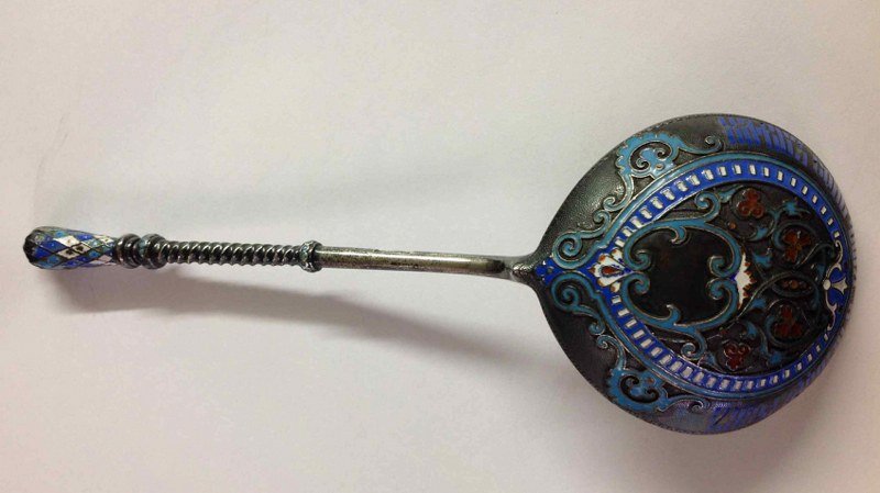 RUSSIAN LARGE ENAMEL SPOON, SIGNED, FROM SAME ESTATE AS: RUSSIAN LARGE ENAMEL SPOON, SIGNED, FROM SAME ESTATE AS OTHER ONE. THIS MEASURES 7 1/2" LONG. HAS SOME ENAMEL OFF ON TOP. MARK LOOKS LIKE HK 1886 88 WITH MAN ON HORSE.