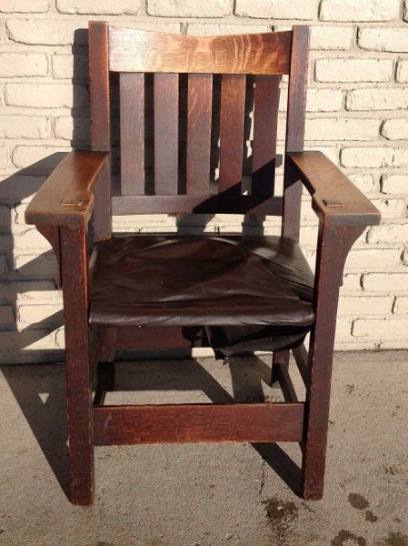STICKLEY, GUSTAV(?) MISSION OAK ARMCHAIR, RED COMPASS: STICKLEY, GUSTAV(?) MISSION OAK ARMCHAIR, RED COMPASS MARK UNDERNEATH ARM, ON BACK IS SMALL SPLIT ON TOP RAIL, WORN ORIGINAL FINISH, MEASURES 38" HIGH, AS PICTURED