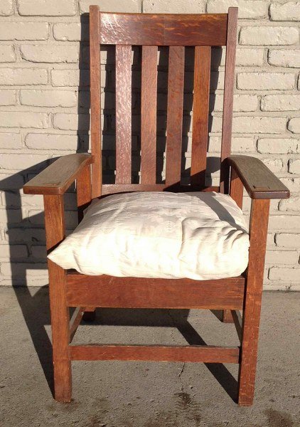 STICKLEY BROS, TALL BACK MISSION OAK ARMCHAIR, ON TOP: STICKLEY BROS, TALL BACK MISSION OAK ARMCHAIR, ON TOP OF BACK HAS SPLIT IN WOOD, MEASURES 42" HIGH, AS PICTURED