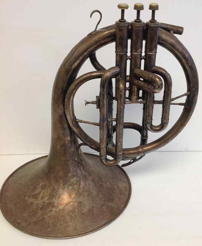 FRANK HOLTON EARLY WHITE BRASS FRENCH HORN, MISSING: FRANK HOLTON EARLY WHITE BRASS FRENCH HORN, MISSING MOUTH PIECE, SOME LIGHT DINGS AND DENTS. VALVES MOVE FREELY, SERIAL NUMBER 11032. FROM ESTATE WITH OTHER INSTRUMENTS.