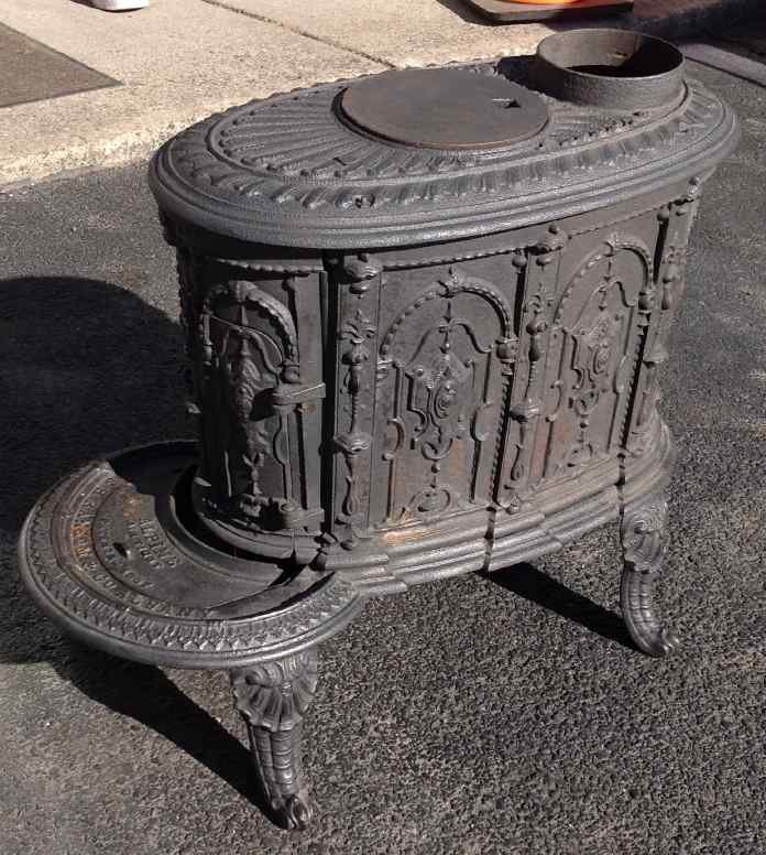 S H RANSOM & CO, ALBANY NEW YORK, CAST IRON SMALL: S H RANSOM & CO, ALBANY NEW YORK, CAST IRON SMALL PARLOR STOVE, MEASURES 21" HIGH X26" FRONT TO BACK, AS PICTURED
