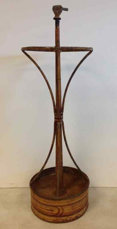 19THc METAL PAINTED CANE OR UMBRELLA STAND, WITH: 19THc METAL PAINTED CANE OR UMBRELLA STAND, WITH FIGURAL HAND FINIAL. APPEARS THE HAND POSSIBLY HELD A CANE OR OBJECT. HAND REMOVES, MEASURES 30" HIGH. PROBABLY LATE 19TH CENTURY.