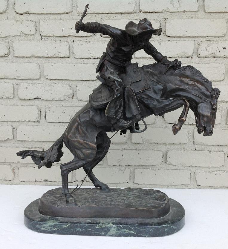 FREDERIC REMINGTON BRONZE "BRONCO BUSTER", RE-CAST,: FREDERIC REMINGTON BRONZE "BRONCO BUSTER", RE-CAST, MEASURES 20" HIGH, NOT INCLUDING THE MARBLE BASE, NICE PATINA. SIGNED AS PICTURED.