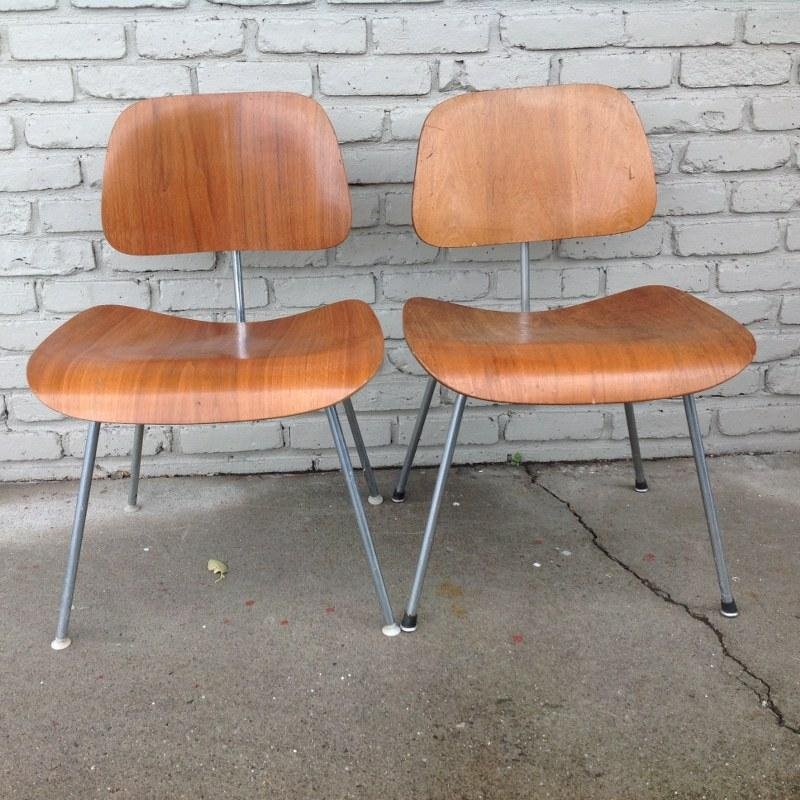 CHARLES EAMES FOR HERMAN MILLER PAIR PLYWOOD CHAIRS: CHARLES EAMES FOR HERMAN MILLER PAIR PLYWOOD CHAIRS WITH CHROME LEGS. FROM LOCAL HUDSON VALLEY ESTATE. BOTH LABELS UNDERNEATH INTACT. IN ORIGINAL CONDITION. ONE IN BETTER SHAPE THAN OTHER, BOTH SOLID,