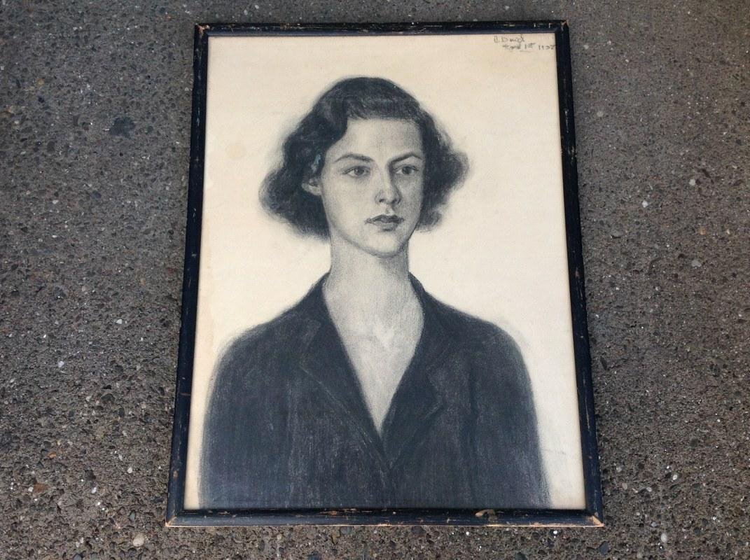 A. DOWD 1938 CHARCOAL PORTRAIT OF A WOMAN: A. DOWD 1938 CHARCOAL PORTRAIT OF A WOMAN, SIGNED AND DATED UPPER RIGHT, IN BLACK WOOD FRAME OF THE PERIOD. MEASURES 25" X 19". FROM HUDSON RIVER HOME.