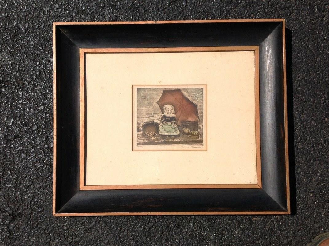 GEORGES PLASSE SIGNED PRINT OF YOUNG FRENCH GIRL IN: GEORGES PLASSE SIGNED PRINT OF YOUNG FRENCH GIRL IN BONNET WITH BASKETS OF FRUITS AND VEGETABLES, HAS A TODD GALLERY FINE ART GALLERY LABEL ON BACK, PRINT MEASURES 6" X 6", FRAMED MEASURES 15" X 18",