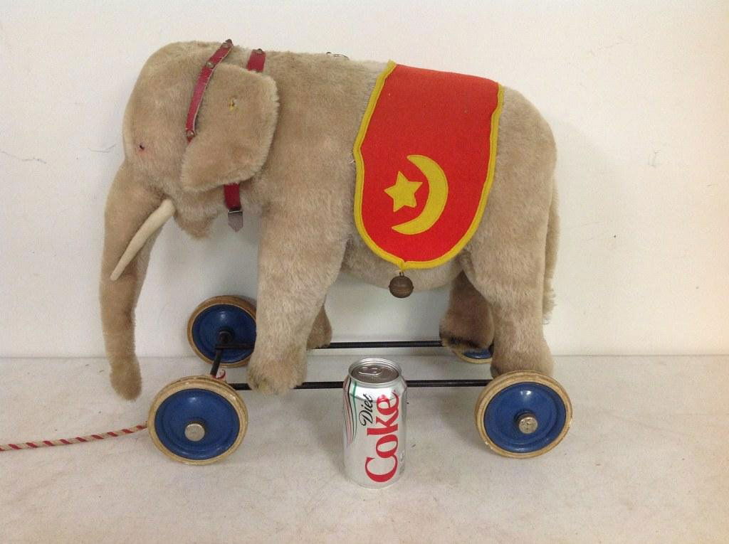 LARGE STEIFF ELEPHANT ON WHEELS, BUTTON 