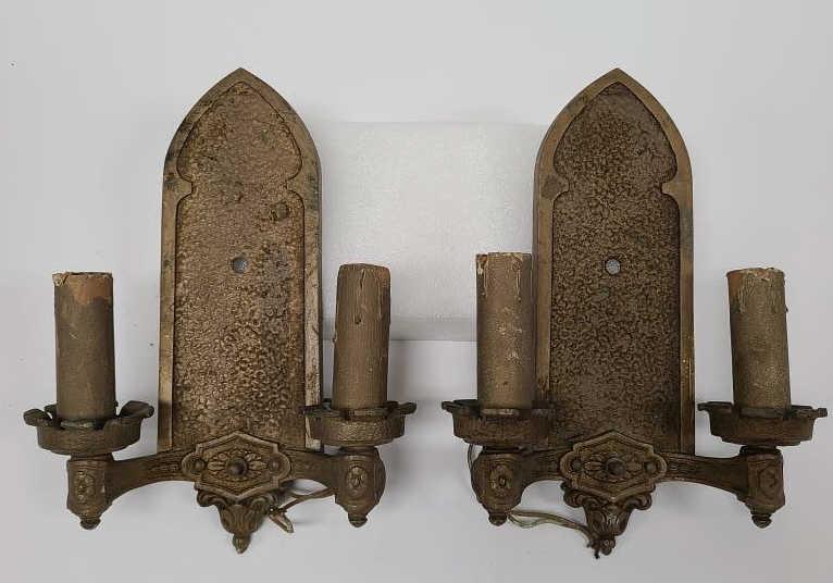 Pair of Bronze Art Deco Wall Sconces: Each measures 13" tall, 9.5" across and 3.75" deep.